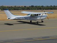 N7561X @ KCCR - Locally-based 1977 Cessna R182 passing public viewing area at Buchanan Field - by Steve Nation