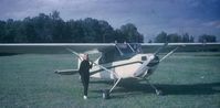 N9129A - This is a picture of my mother standing next to N9129A sometime in the early 1970's, I believe. My father owned this aircraft from the mid 1960's to early 1980's. - by Robert Clough