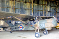 XR240 @ EGSP - Auster AOP.9 hangered at Sibson in May 1978. - by Peter Nicholson