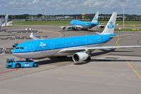 PH-AOK @ EHAM - KLM being towed onto stand