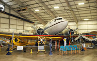 N165LG @ KBDL - The NEAM Douglas DC-3, originally a USAAF C-49J, towers over a host of Golden Age jewels. - by Daniel L. Berek
