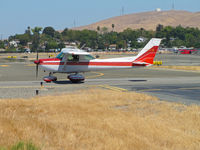N757NQ @ KCCR - Pacific States Aviation 1977 Cessna 152 taxis for RWY1R - by Steve Nation