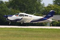 N5738W @ OSH - Departing Airventure 2010 - Oshkosh, Wisconsin - by Bob Simmermon