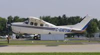 C-GWYM @ KOSH - EAA AIRVENTURE 2010 - by Todd Royer