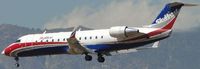 N947SW @ ONT - On final over the outer fence for runway 26R - by Helicopterfriend