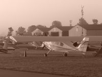 N82BT @ KOSH - Foggy Morning at Oshkosh 2010. - by Steve C