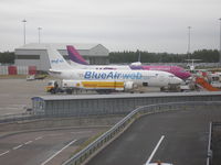 YR-BAC @ EGGW - Luton Airport - by Henk Geerlings