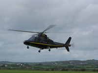 G-TELY @ EGFP - Castle Air Ltd's Agusta A109 departing Pembrey Airport, Wales, UK - by Roger Winser