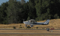 N199MC @ KAUN - 1977 Cessna 172N landing at Auburn, CA - by Steve Nation