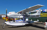 N142HF @ KRTS - 1999 float-equipped Cessna T206H in manufacturers ramp @ 2009 Reno Air Races (taxiing for take-off) - by Steve Nation