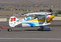 N180TT @ KRTS - Race #31 1979 Martin PITTS S-1 Tango Tango for Biplane Class ramp @ 2009 Reno Air Races (being towed to hangar after heat) - by Steve Nation