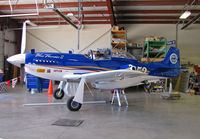 N352BT @ KRTS - Race #352 American Air Racing Ltd THUNDER MUSTANG Blue Thunder II for Sport Class race @ 2009 Reno Air Races - on jacks in hangar - by Steve Nation
