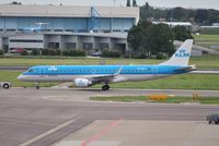 PH-EZD @ EHAM - KLM cityhopper on tow