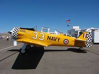 N2757 @ KRTS - Race #33 is a 1941 AT-6C in Royal Canadian colors Midnight Rendezous in pits for T-6 Class race @ 2009 Reno Air Races - by Steve Nation