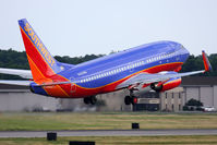 N450WN @ ORF - Southwest Airlines N450WN (FLT SWA881) departing RWY 23 enroute to Baltimore/Washington Int'l (KBWI).