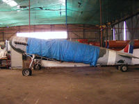 BAPC283 @ X9JU - Full size model of Vickers Supermarine Spitfire in storage at Jurby Airfield, IOM. - by Chris Hall