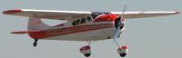 N4420C @ POC - Half way down the runway and still under power and climbing out - by Helicopterfriend