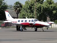 N312MT @ POC - Appears to be waiting for someone to arrive, notice EMT insignia on tail - by Helicopterfriend