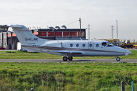 G-KLNR @ EGGW - 2009 Raytheon Aircraft Company Hawker 400XP, c/n: RK-552 at Luton - by Terry Fletcher