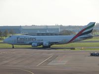 N408MC @ AMS - Taxi to the runway - by Willem Goebel