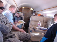 N41AV @ SYA - 15 Passenger load max. Cabin in fair shape (condition is light soil on fabric). Room for most people to spread out and rest in comfort. - by Brian Jensen