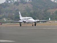 N710JP @ POC - Taxiing eastbound to runway 26L - by Helicopterfriend