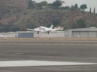 N710JP @ POC - Lift off westbound from runway 26L - by Helicopterfriend