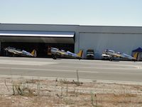 N48742 @ CCB - N48742, N46234, N56026 parked by a hanger for dispaly - by Helicopterfriend