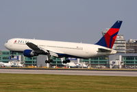 N195DN @ EGCC - Delta Airlines - by Chris Hall