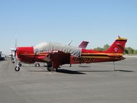 N460YR @ CCB - Covered and tied down in transient parking - by Helicopterfriend