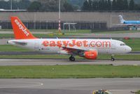 G-EZAO @ EHAM - EasyJet lining up