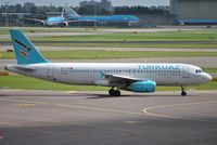 TC-TCD @ EHAM - Turkish charter flight taxiing out for departure - by Robert Kearney