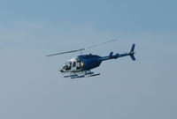 N206MB - A Bell Jet Ranger on Oil Search duty looking for oil from the Deep Water Horizon (BP) leak along the Gulf of Mexico in Miramar Beach, Fla. on July 31, 2010. (an f-stop 5.6 photo) - by Bill Thornton,