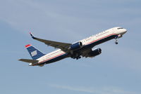 N940UW @ EBBR - Flight US751 is taking off from RWY 07R - by Daniel Vanderauwera