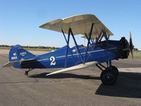 N9024 @ KAXN - Curtiss Wright Travel Air 4000 at the fuel pump. - by Kreg Anderson