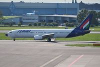 HA-LOH @ EHAM - Malev taxiing for departure
