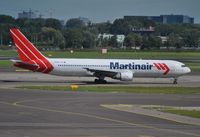 PH-MCI @ EHAM - Martinair taxiing for departure