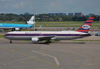 PH-MCL @ EHAM - Retro Martinair taxiing for departure