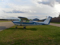 N7426X @ KTVC - Tied down on the west side of KTVC - by Tim Timmons