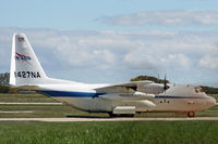 N427NA @ KRAC - The auxiliary fuel tank advertises the Kenosha Military Museum, of which this aircraft is now a part. - by Daniel L. Berek