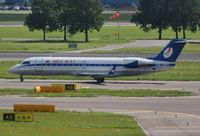 EW-100PJ @ EHAM - Very hazy picture of Belavia taxiing for departure