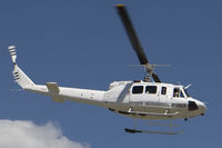 C-FBUA @ CYYC - Bell 212 - by Andy Graf-VAP