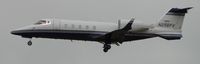 N256FX @ ONT - On final to runway 26R on a very overcast day - by Helicopterfriend