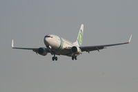 PH-XRX @ EBBR - Flight HV2706 on approach to RWY 25L - by Daniel Vanderauwera