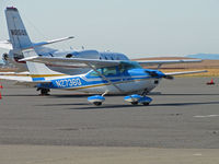 N2736Q @ KAPC - Locally-based 1967 Cessna 182K taxiing past Netjets N615QS on way to gas pumps - by Steve Nation
