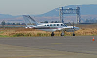 N2660U @ KAPC - 1981 Cessna 421C taxiing for takeoff past Napa River RR bridge - by Steve Nation