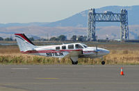 N879JN @ KAPC - Japan Air Lines Beech 58 returning from training flight -Napa River RR bridge - by Steve Nation