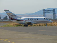 N828QS @ KAPC - Napa River RR bridge frames Netjets 2001 Hawker 800XP departing for KSUS (Spirit of St.Louis Airport, MO) - by Steve Nation