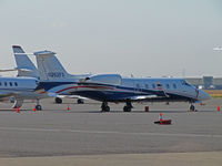 N262FX @ KAPC - Flexjets 2007 Learjet 60 on bizjet ramp after flight from KSUS (Spirit of St.Louis Airport, MO), - by Steve Nation