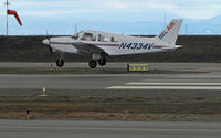 N4334V @ KSQL - Bel Air 1984 PA-28-181 near touchdown at San Carlos, CA - by Steve Nation